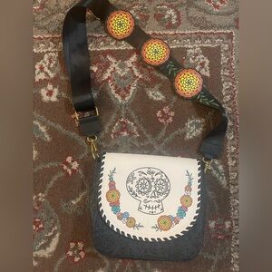 Disney Coco Dia de Los Muertos Loungefly purse with decorated strap